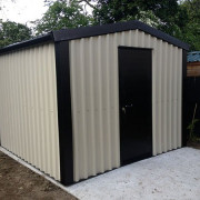 Small cream steel building